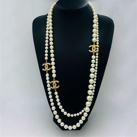 chanel long pearl necklace fake|chanel pearl long strand necklaces.